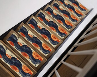 May include: A set of stair treads featuring a repeating pattern of blue and orange swirls. The treads are made of wood and have a natural finish.