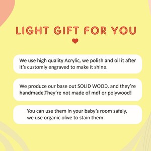 May include: A yellow background with red text reading "LIGHT GIFT FOR YOU". The image includes text detailing the use of high-quality acrylic, solid wood bases, and organic olive stain for baby room safety.
