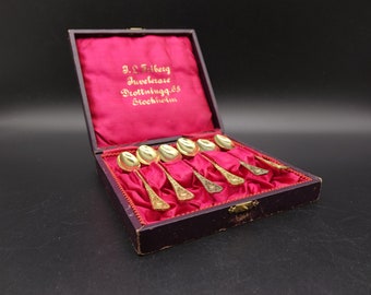 Set of 6 Antique/Vintage Tea / Coffee Spoons Gold Plated whit Interesting motifs. Spoons from J. L. Friberg Jewelry Store 1913-35 in box