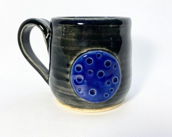 9 oz. Moon mug with black glaze and blue moon handmade pottery
