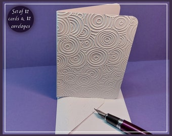 12 Handmade Concentric Circles Embossed Cards and Envelopes. A6.  Blank inside for your own message. Hand press embossed.