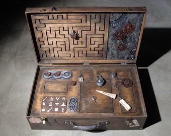 Portable game. Suitcase Magic creatures.