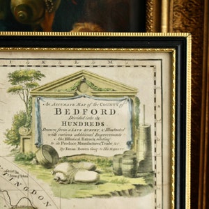 May include: An antique map of the County of Bedford, England, divided into its hundreds. The map is illustrated with various additional improvements, historical extracts, and details relating to its produce, manufactures, and trade. The map is drawn by Eman: Bowen Geog: to His Majesty.