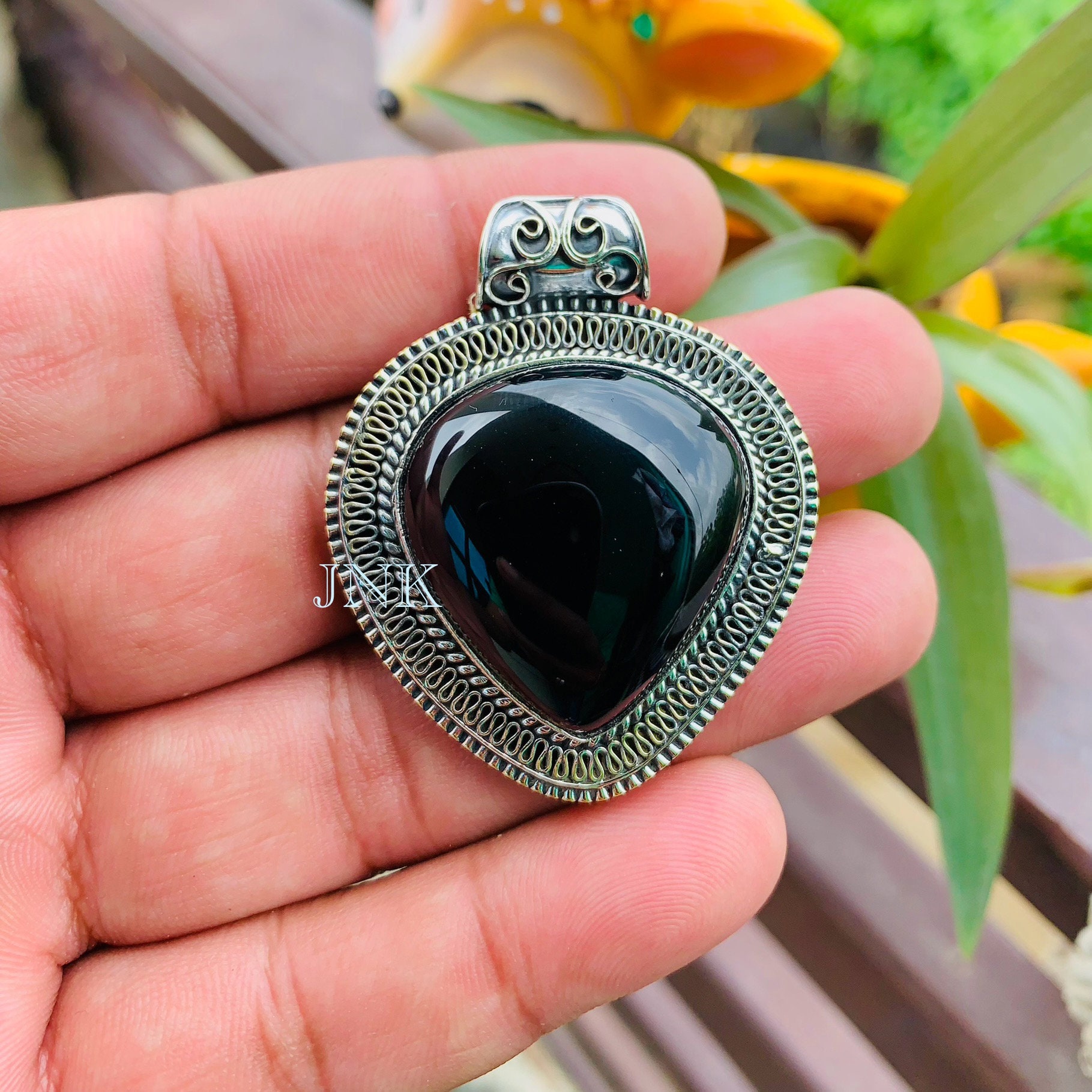 Silver necklace with black pendant hot sale
