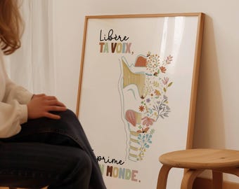 May include: A framed art print with a wooden frame. The artwork features a colorful illustration of the human throat, with floral elements and the French text "Libère ta voix, exprime ton monde."