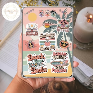 May include: A clear tablet case featuring colorful stickers with a retro theme. The stickers include phrases like "Beach, Booze, & Books" and "Read or Be Cursed." Other stickers depict a pumpkin, a ghost reading, and a witch.