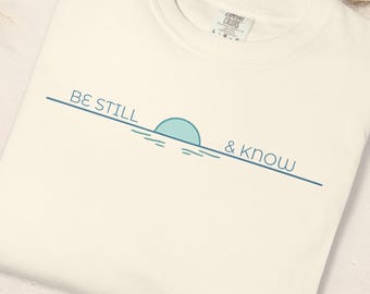 Minimalist Christian Shirt | Be Still and Know Tee | Comfort Colors 1717 Ivory | Scripture Line Art Graphic | Aesthetic Ocean Bible Verse