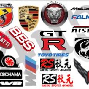 May include: A selection of car brand logos and decals, such as BMW, Toyota, and Nissan, in diverse colours and designs. The image includes logos for 3M, Rocket Bunny, and Toyo Tires. Suitable for car enthusiasts.
