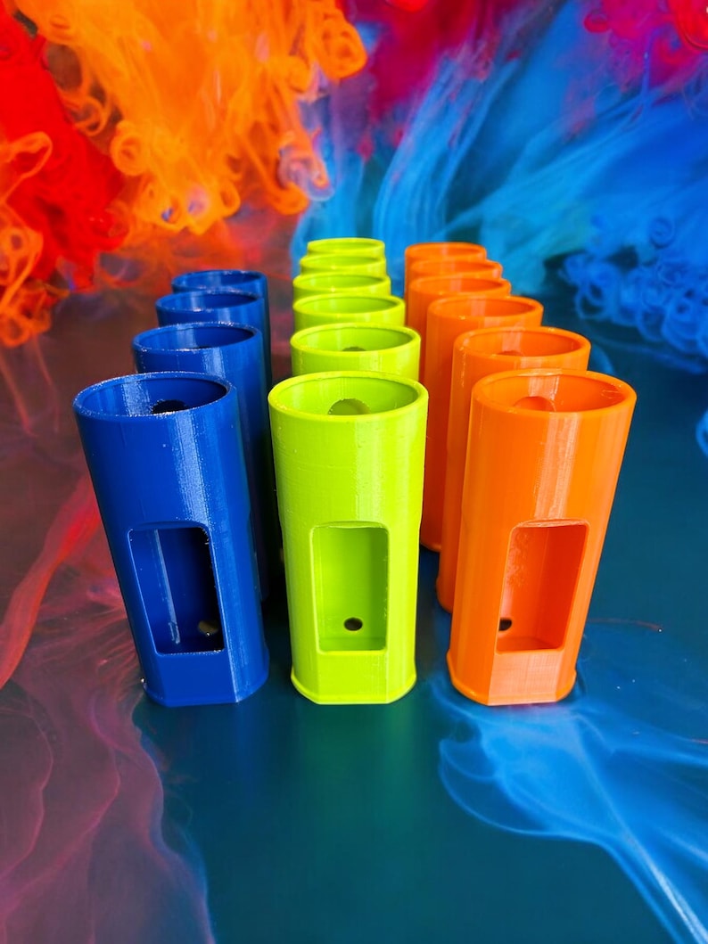 May include: A row of colorful, cylindrical containers with a hole in the center. The containers are arranged in a rainbow pattern, with blue, green, and orange containers.