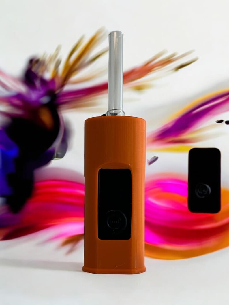 May include: A brown and black torch lighter with a silver metal nozzle. The lighter has a black rectangular display screen.