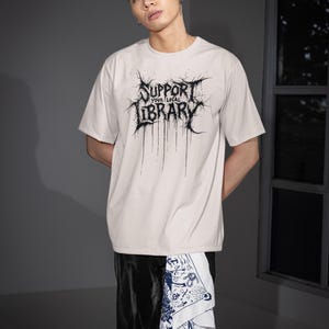 Support Your Local Library Shirt, Metal Book Lover Tee, Comfort Colors Goth Shirt, Funny Reading Shirt, Library Punk Shirt, Black Tee zdjęcie 5