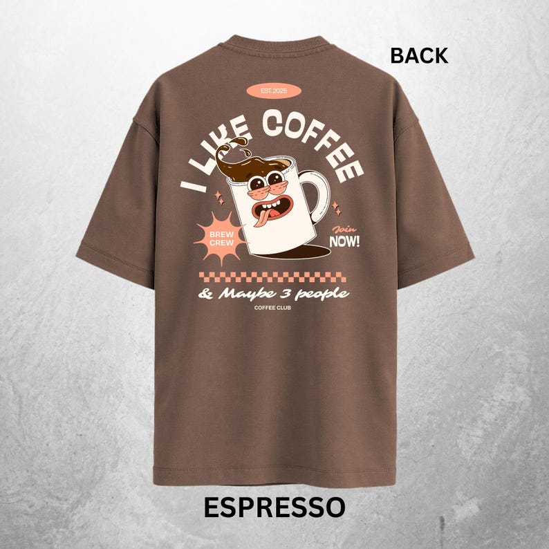 May include: Espresso-colored t-shirt with a graphic on the back that says "I Like Coffee" in white letters. The graphic includes a cartoon coffee mug with a face, and the text "& Maybe 3 people Coffee Club".