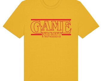 May include: A yellow t-shirt with the text "GAME NIGHT" in red.