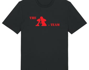 May include: Black t-shirt with a red graphic of a stylized "A" and the text "THE A-TEAM".