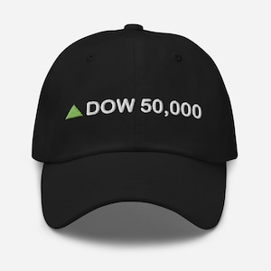 May include: Black baseball cap with the text "DOW 50,000" in white, and a green upward-pointing triangle. The cap has a curved brim and a button on top. The hat is made of a soft material.