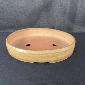 Oval bonsai pot in red stoneware.