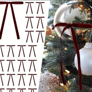May include: A set of 25 burgundy velvet ribbon bows. The bows are tied in a simple knot and are ideal for adding a touch of elegance to any gift or craft project.