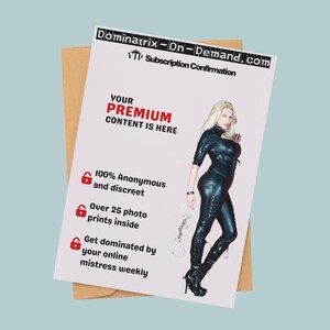 May include: A promotional card with the text "Dominatrix-On-Demand.com" and "Subscription Confirmation". The card features a woman in a black outfit and the text "YOUR PREMIUM CONTENT IS HERE". Additional text includes "100% Anonymous and discreet", "Over 25 photo prints inside", and "Get dominated by your online mistress weekly".