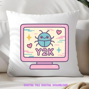 May include: A white pillow with a pink computer screen design. The screen displays a cartoon beetle, hearts, stars, and the text "Y2K". The design has a pastel color scheme with pink, blue, yellow, and purple accents.