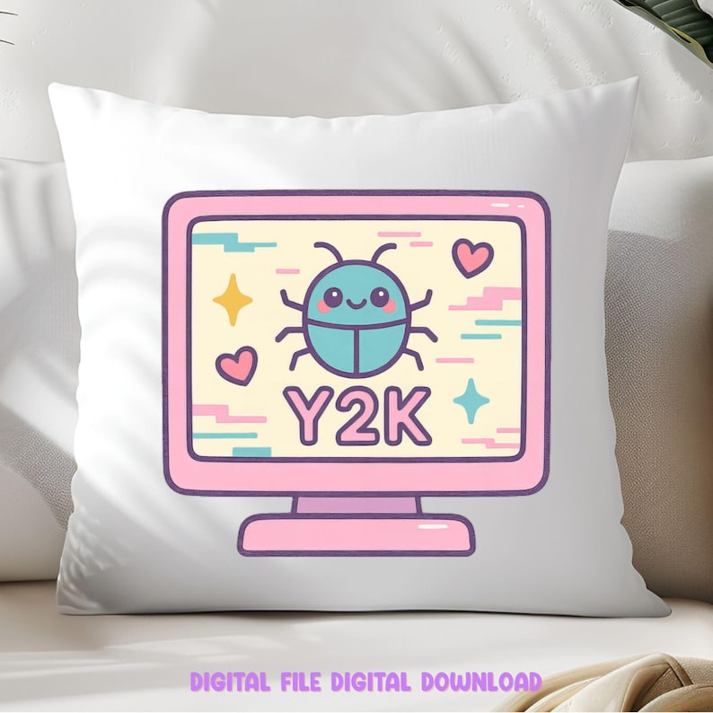 May include: A white pillow with a pink computer screen design. The screen displays a cartoon beetle, hearts, stars, and the text "Y2K". The design has a pastel color scheme with pink, blue, yellow, and purple accents.