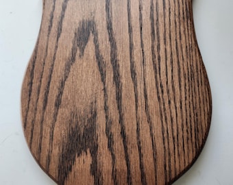 These are medium size trophy mounts made from solid hardwood.