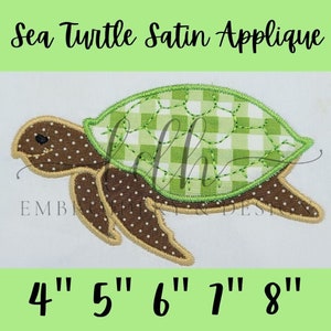May include: A sea turtle satin applique design. The turtle has a brown body with white polka dots, a green and white checkered shell, and a tan outline. Sizes available: 10 cm, 13 cm, 15 cm, 18 cm, and 20 cm in height.