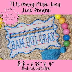 May include: A beige and blue embroidered Mah Jong line reader with the text "BAM DOT CRAK". The reader has a wavy border and a blue tassel. It measures 6.38" x 4". The text "Includes instructions for a clean back!" is also present.