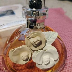 vintage eau de parfum Valentino with 3 flowers vintage big bottle