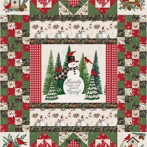 May include: A Christmas-themed quilt with a patchwork design. The quilt features a snowman, red cardinals, and pine trees. The central panel has the text "Friends Make the Season Merry?" in a circular design. The colour scheme is red, green, and white.