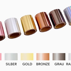 May include: Six rolls of metallic foil tape in various colours: rose gold, silver, gold, bronze, grey, and rainbow.