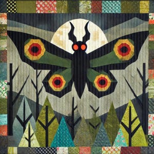 May include: A quilt with a moth design set against a full moon. The moth is black with green wings and red and yellow eye details. The background features trees and geometric patterns. The quilt's dimensions are not specified.