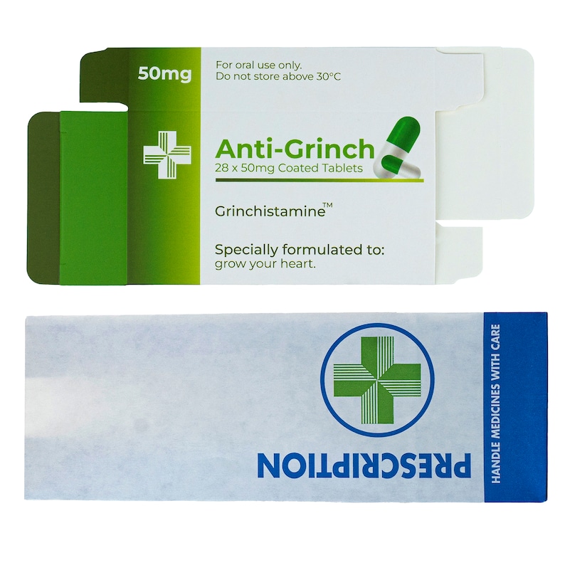 May include: A green and white box of Anti-Grinch 50mg coated tablets. The box has a green cross and the text "For oral use only. Do not store above 30&deg;C". The box also has a green and white pill illustration.