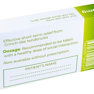 May include: White box with green and white text and a barcode. The text reads "Effective short-term relief from Grinch-like tendencies. Dosage: Recommended to be taken with a healthy dose of social interaction. Now available without prescription. PATIENT'S NAME" and "50mg".