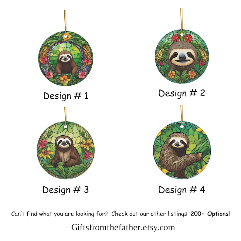 May include: Four round ceramic ornaments with a stained glass design featuring a sloth in a tropical setting. The ornaments are decorated with green leaves, flowers, and pineapples. The sloth is brown with a white face and black eyes. The ornaments are labeled with the numbers 1 through 4.