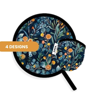 May include: A round folding fan with a dark blue background featuring a botanical pattern of green eucalyptus leaves and orange spherical flowers. The fan has a black border and a small pouch in the same print. A label reads 4 DESIGNS.