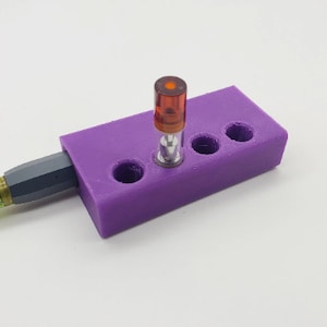 AiroPro 気化器とカートホルダー | AirPro バッテリーとカートリッジ 4 個を収納