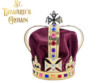 May include: A gold crown with a red velvet lining and colorful jewels. The crown is topped with a black cross and has the text "St. Edward's Crown" printed on the image.