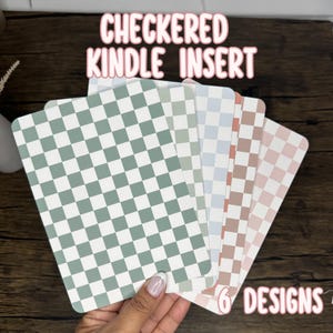 May include: A collection of six Kindle inserts with a checkered pattern in various colors, including green, blue, and pink. The text "CHECKERED KINDLE INSERT" is displayed at the top, and "6 DESIGNS" is at the bottom.