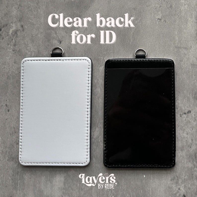 May include: Two ID badge holders, one white and one black, with a clear back for ID. The white holder has a stitched border and a silver ring at the top. The black holder has a clear front. The text "Clear back for ID" is at the top.