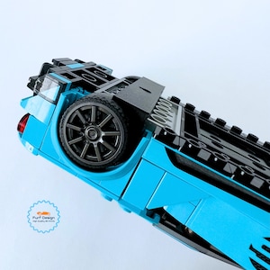 Shows the available wall mount fitting around the wheels of the car as it would be when the car is displayed.