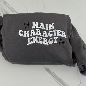Embroidered Main Character Energy Sweatshirt: Cozy Meme Crewneck