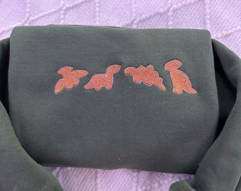 Embroidered Dino Nuggets Sweatshirt: Funny Dinosaur Sweater