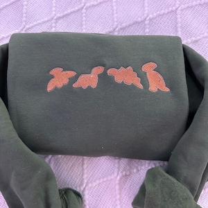 Besticktes Dino Nuggets Sweatshirt: Lustiges Dinosaurier-Pullover