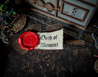 Oath of Moment Reinheits-Siegel Token – Handgefertigtes Kriegshammer-Accessoire aus Wachs & Leinwand