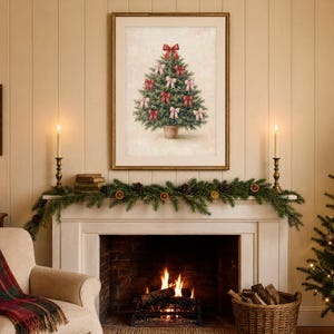 May include: A framed wall art print featuring a green Christmas tree in a terracotta pot, decorated with multiple red and light pink bows, displayed in a gold frame against a light-colored wall above a fireplace mantel.