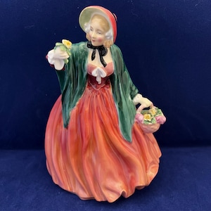 Royal Doulton Lady Charmian Figurine – Red Dress with Yellow Roses – HN1949 – Bone China – Made in England