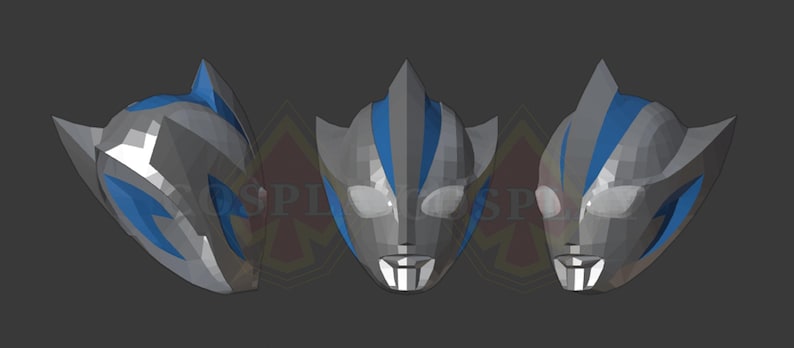 May include: Three-dimensional, geometric mask design in gray and blue. The mask features a stylized face with pointed ears and a central crest. Blue accents highlight the eyes and forehead, creating a futuristic aesthetic. The masks are displayed against a dark gray background.