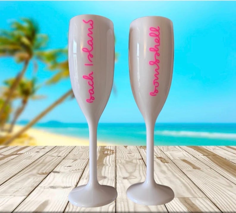 Personalized acrylic champagne flutes with custom Love Island inspired names and colorful vinyl decals. Lightweight reusable 5 oz flutes perfect for bachelorette parties, bridal showers, girls trips, birthdays, and party favors. Customized drinkware with tropical summer aesthetic.