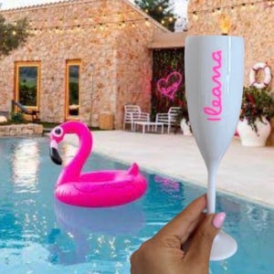 Personalized acrylic champagne flutes with custom Love Island inspired names and colorful vinyl decals. Lightweight reusable 5 oz flutes perfect for bachelorette parties, bridal showers, girls trips, birthdays, and party favors. Customized drinkware with tropical summer aesthetic.