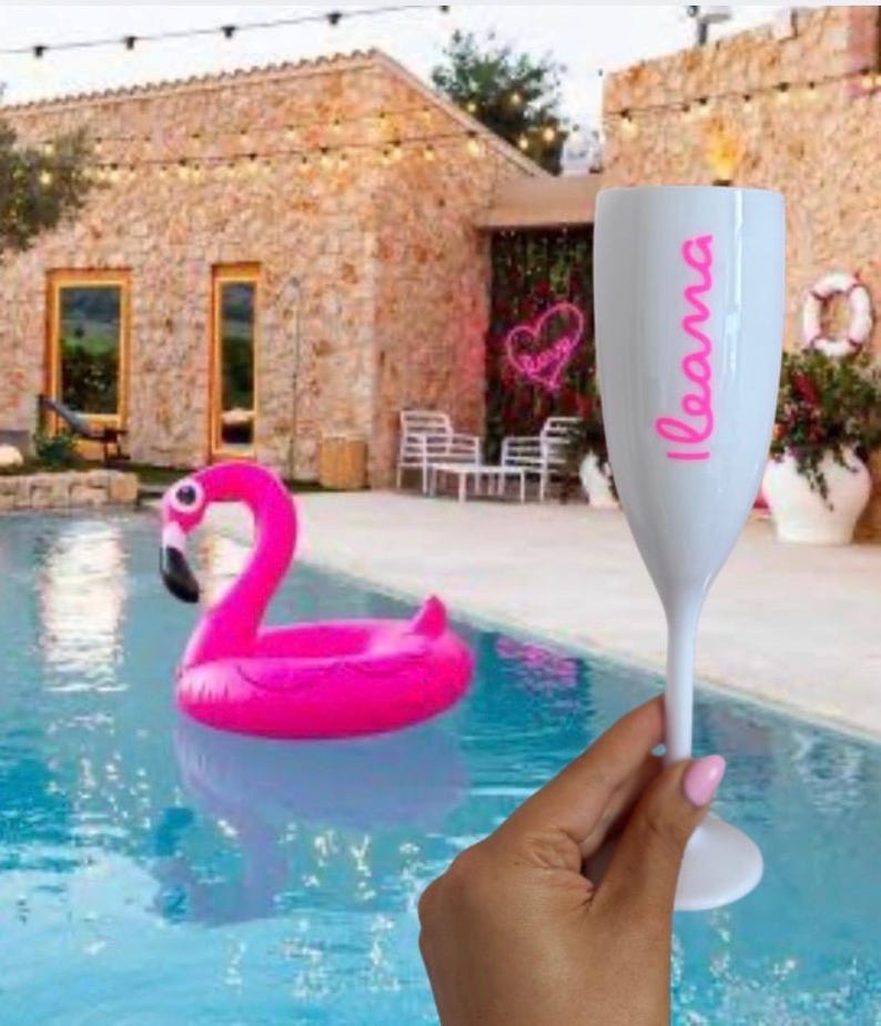 Personalized acrylic champagne flutes with custom Love Island inspired names and colorful vinyl decals. Lightweight reusable 5 oz flutes perfect for bachelorette parties, bridal showers, girls trips, birthdays, and party favors. Customized drinkware with tropical summer aesthetic.